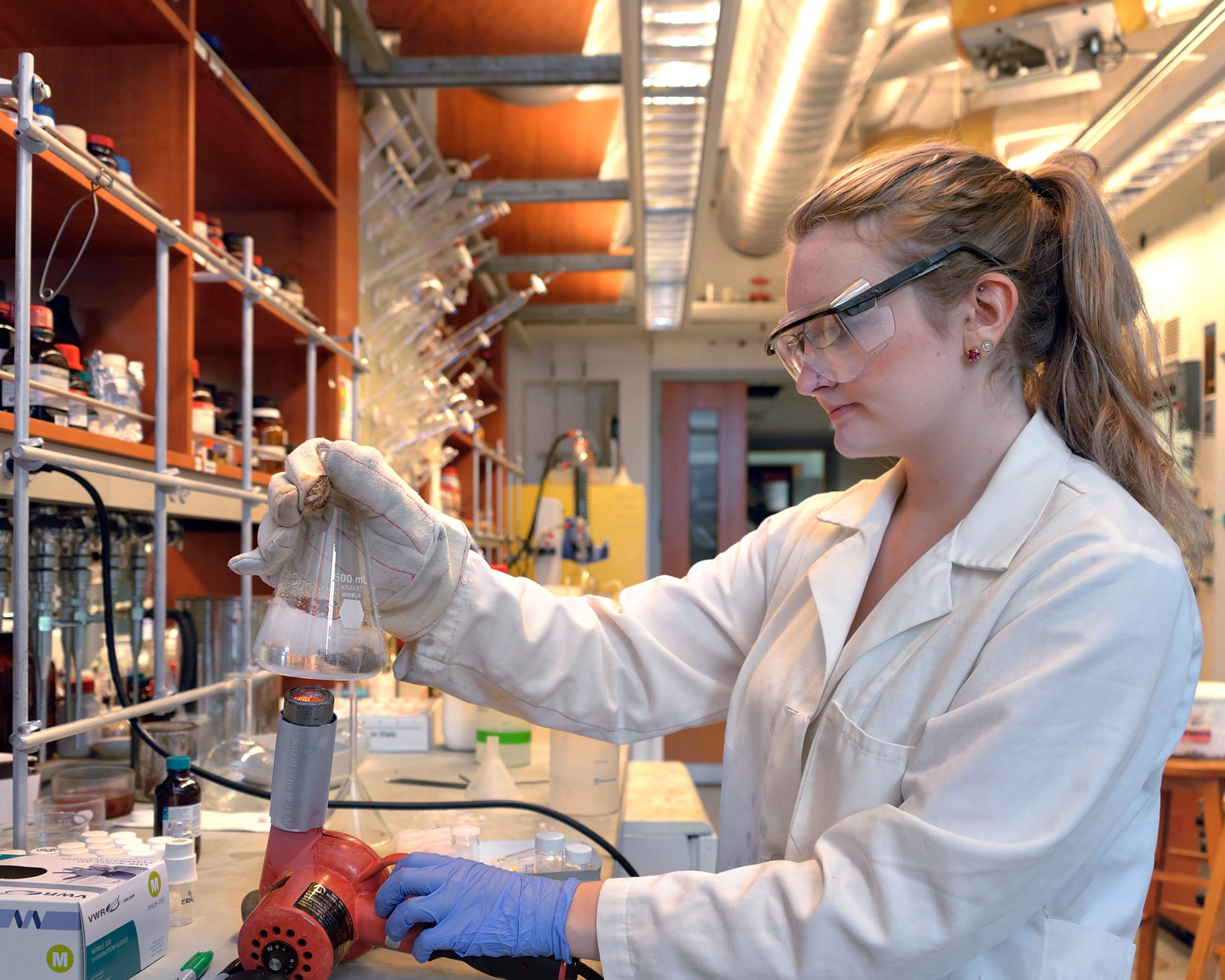 REU-17 Emily McClure working in a Chemistry lab